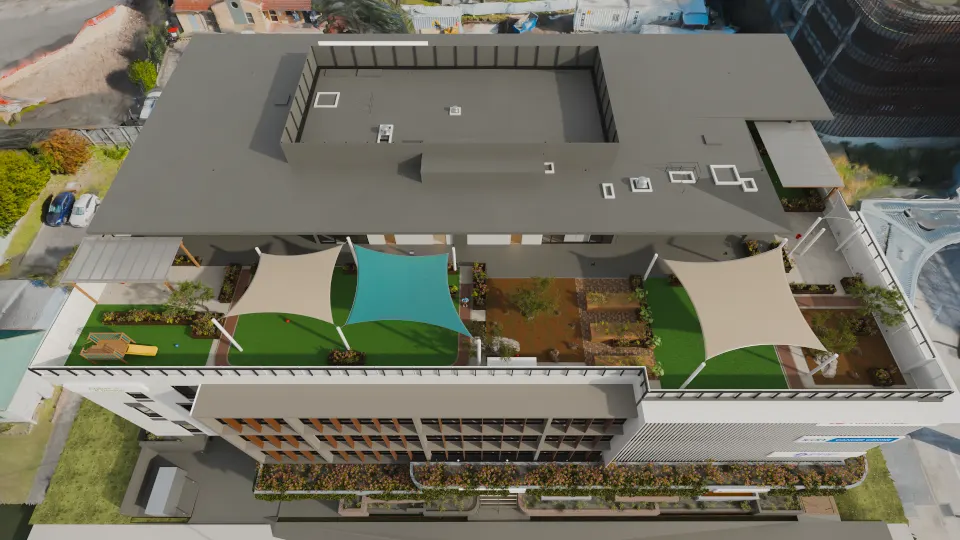 Bird’s-eye render of the Level 4 early learning rooftop: three shade sails over green turf, garden beds and a timber play frame, with the plant roof behind