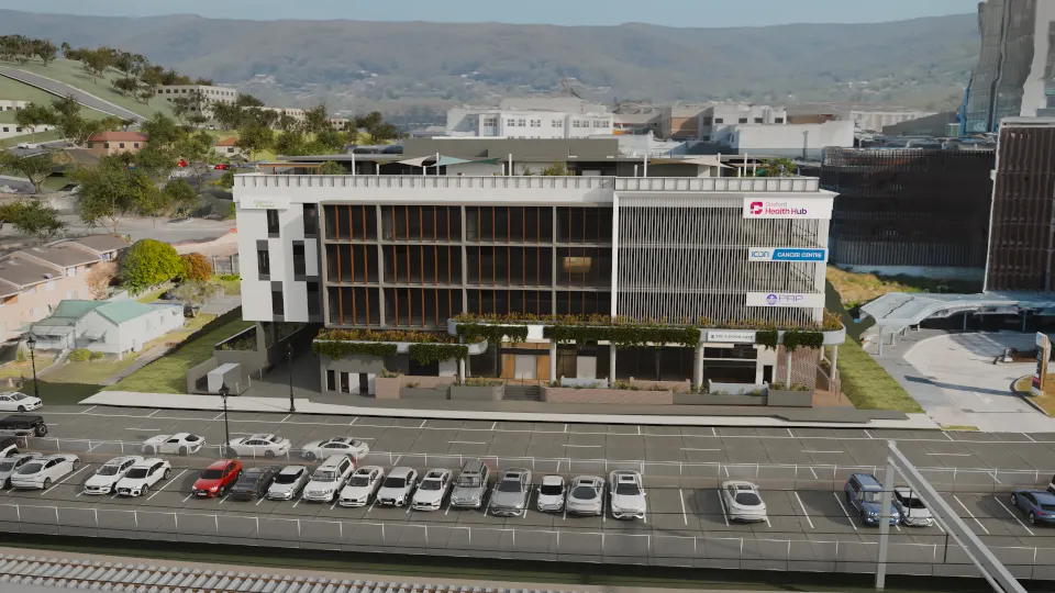 Render of the Showground Road frontage seen from over the station car park, with the hospital campus and wooded hills behind